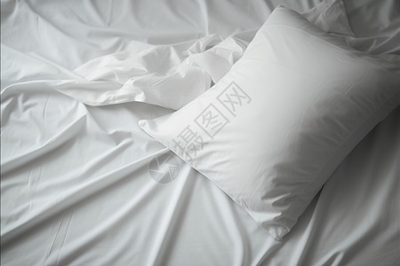 白色床单枕头特写图片