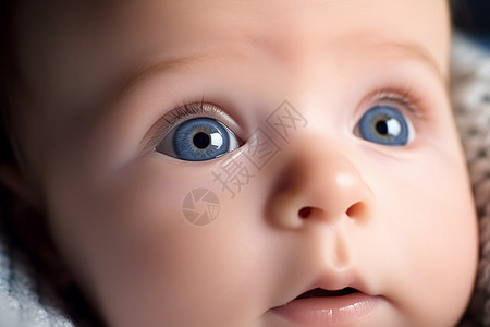 可爱的蓝眼睛婴儿背景图片