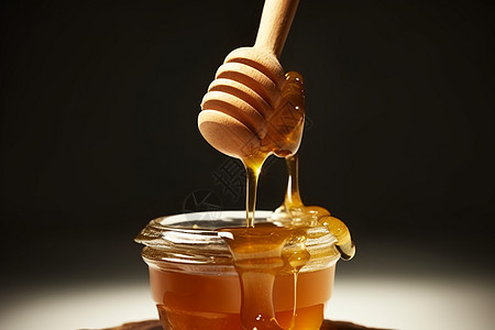 蜂蜜勺子和蜂蜜图片