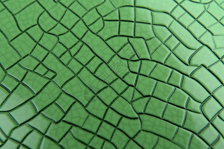 绿色瓷砖的裂缝图片