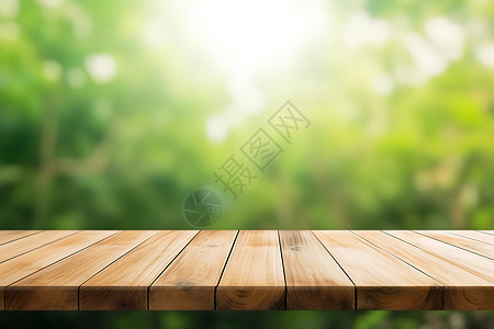 木制桌面与模糊的绿色花园图片
