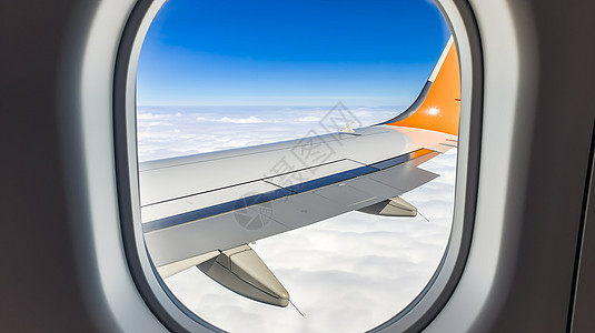 从飞机窗观看云层景观背景图片