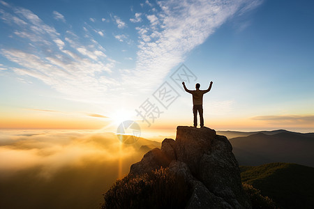 登山者在山顶胜利图片