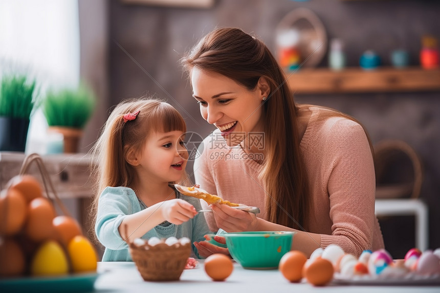 妈妈和她女儿在厨房里一起制作饼干图片