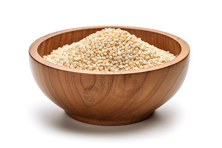 白色背景上的木碗中的高粱米图片