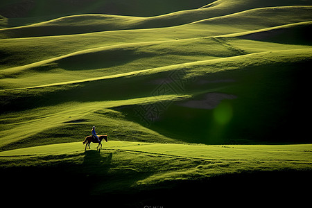 草原上骑马的人高清图片