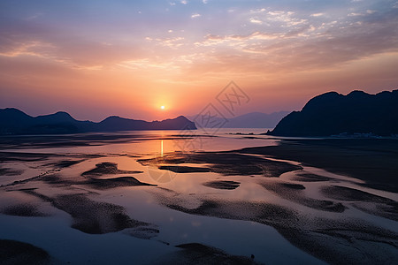 日出朝霞大海滩涂图片