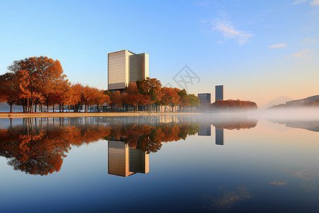 湖面上倒映的树木和建筑风景图片