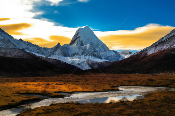 雪山脚下的河流图片