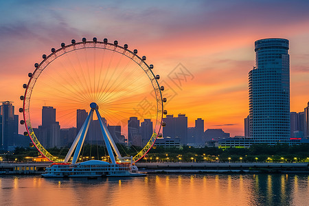 城市景色夕阳下的摩天轮与城市背景