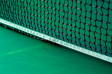 破旧的网球网背景图片