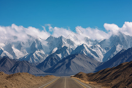 雪山前的公路图片