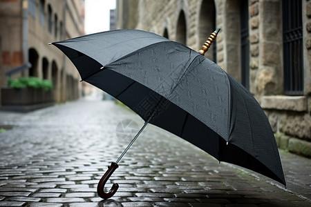 街道上的伞黑伞黑雨伞高清图片