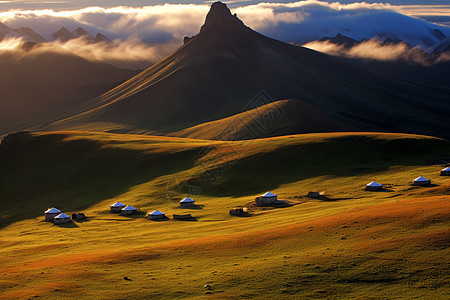 山川下的草原背景图片