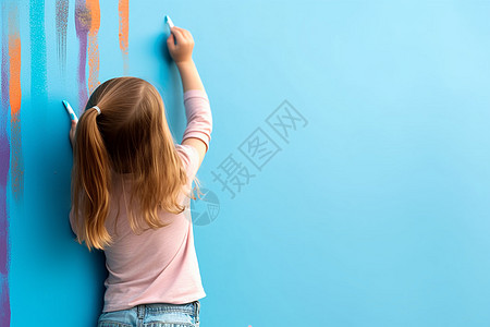 孩子在墙上画画小女孩在彩色墙上画画背景