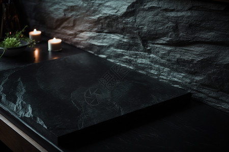 灰黑石板上点着蜡烛背景图片