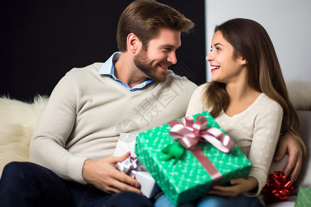 圣诞节互送礼物的情侣背景图片