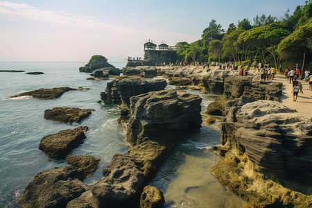 夏季的海边岩石景观背景图片