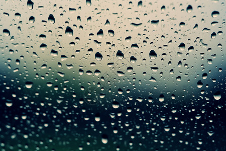 雨水玻璃雨水滑落玻璃的背景设计图片
