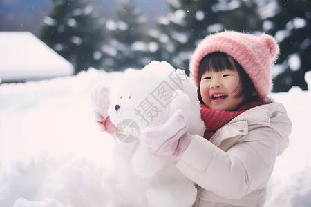 户外玩雪的可爱小女孩背景图片