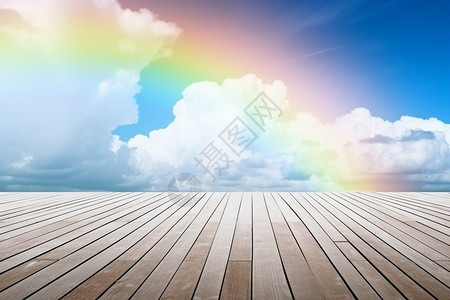 彩虹下的木板地面图片