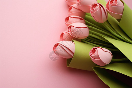 粉红色的郁金香纸花背景图片