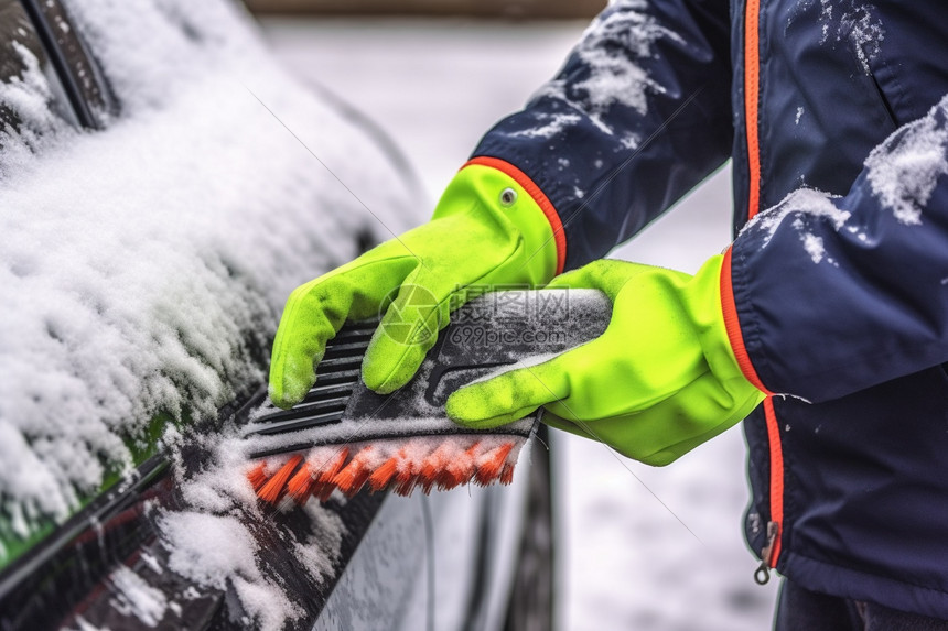 冬季清扫汽车的积雪图片