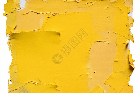 撕裂的黄色墙纸背景图片