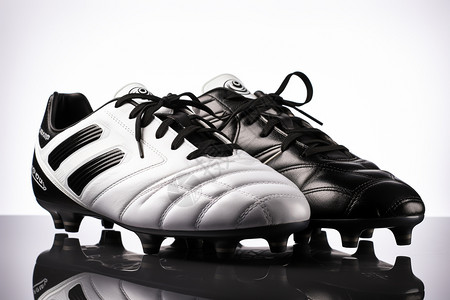 体育用品白色和黑色的足球鞋背景