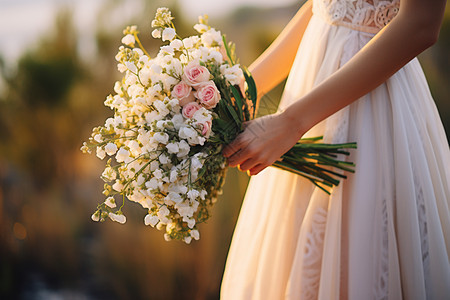 手握鲜花的新娘图片