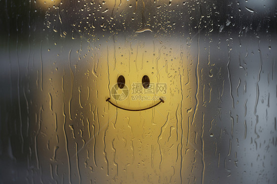 玻璃雨滴上的笑脸图片