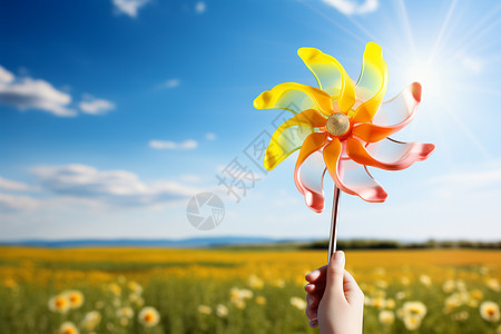 手拿鲜花的孩子鲜花海中一个孩子手捧风车背景