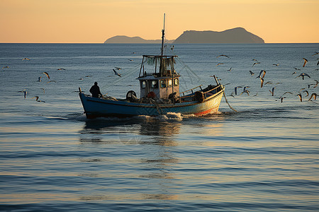 渔船出海海洋中出海打鱼的渔船背景