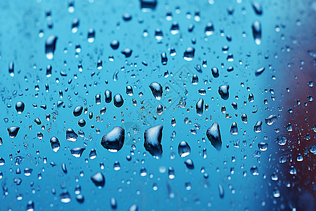 潮湿天气窗户上滑落的雨滴设计图片