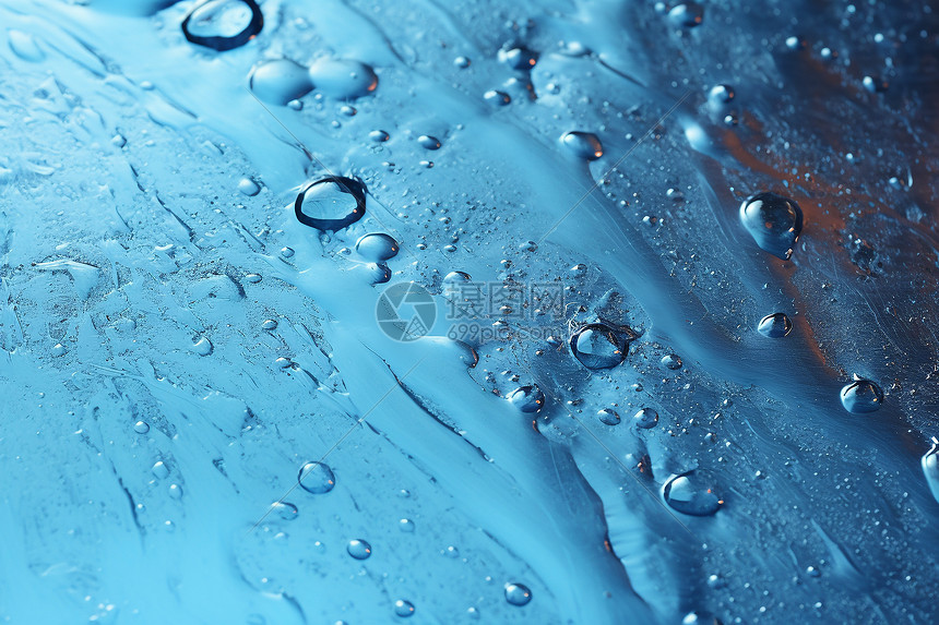 蓝色背景的雨滴图片