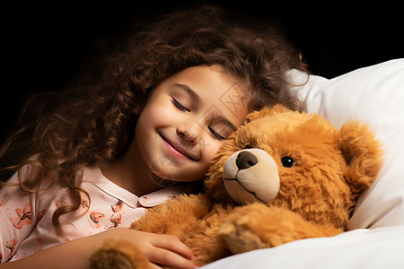 抱着泰迪熊入睡的女孩图片