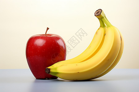 饱满的香蕉和苹果背景图片