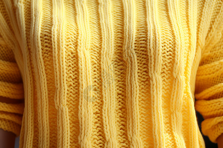 毛衣材质黄色的毛衣背景