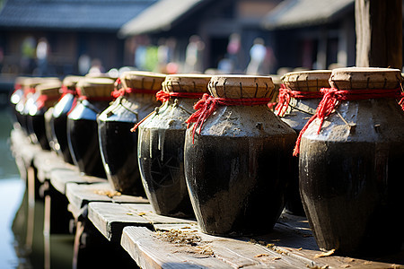 古村的酒坛子背景图片