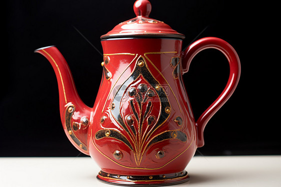 美观的红色茶壶图片