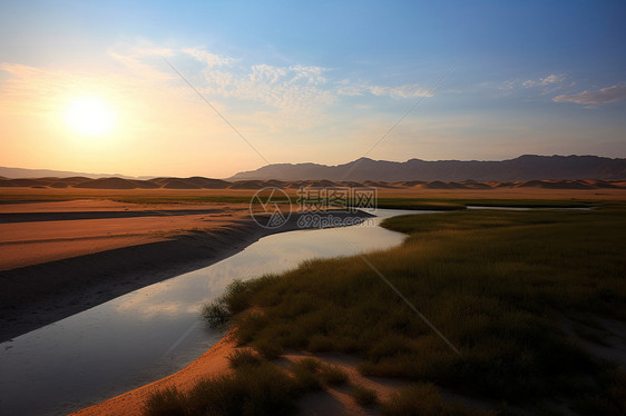 沙丘上的美丽日落景色图片