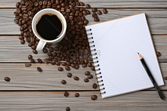 木桌上的咖啡和空白笔记本图片
