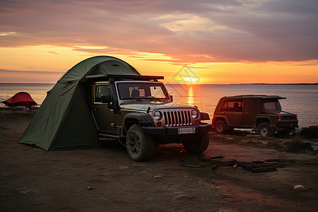 日出海边露营旅行背景图片