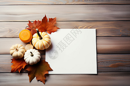木质桌子上的秋叶图片