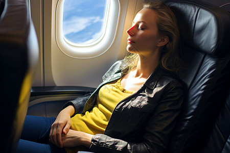 飞机窗边疲惫的女子图片