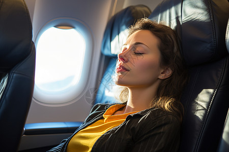飞机座椅上沉睡的女子图片