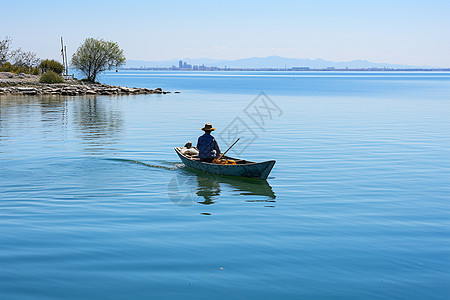 湖上划船的男人图片