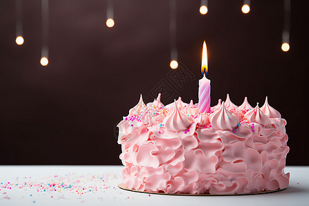 粉色蛋糕和蜡烛图片