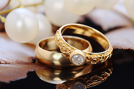 珠宝拍摄黄金的结婚戒指背景