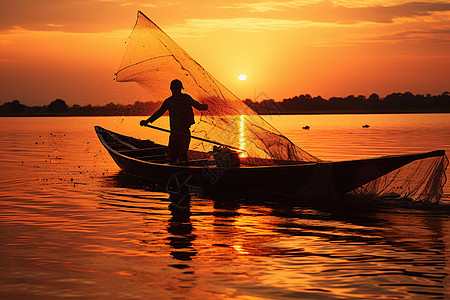 爱在黄昏日落时黄昏时带着渔网驾船在水上背景